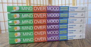stack of mind over mood books